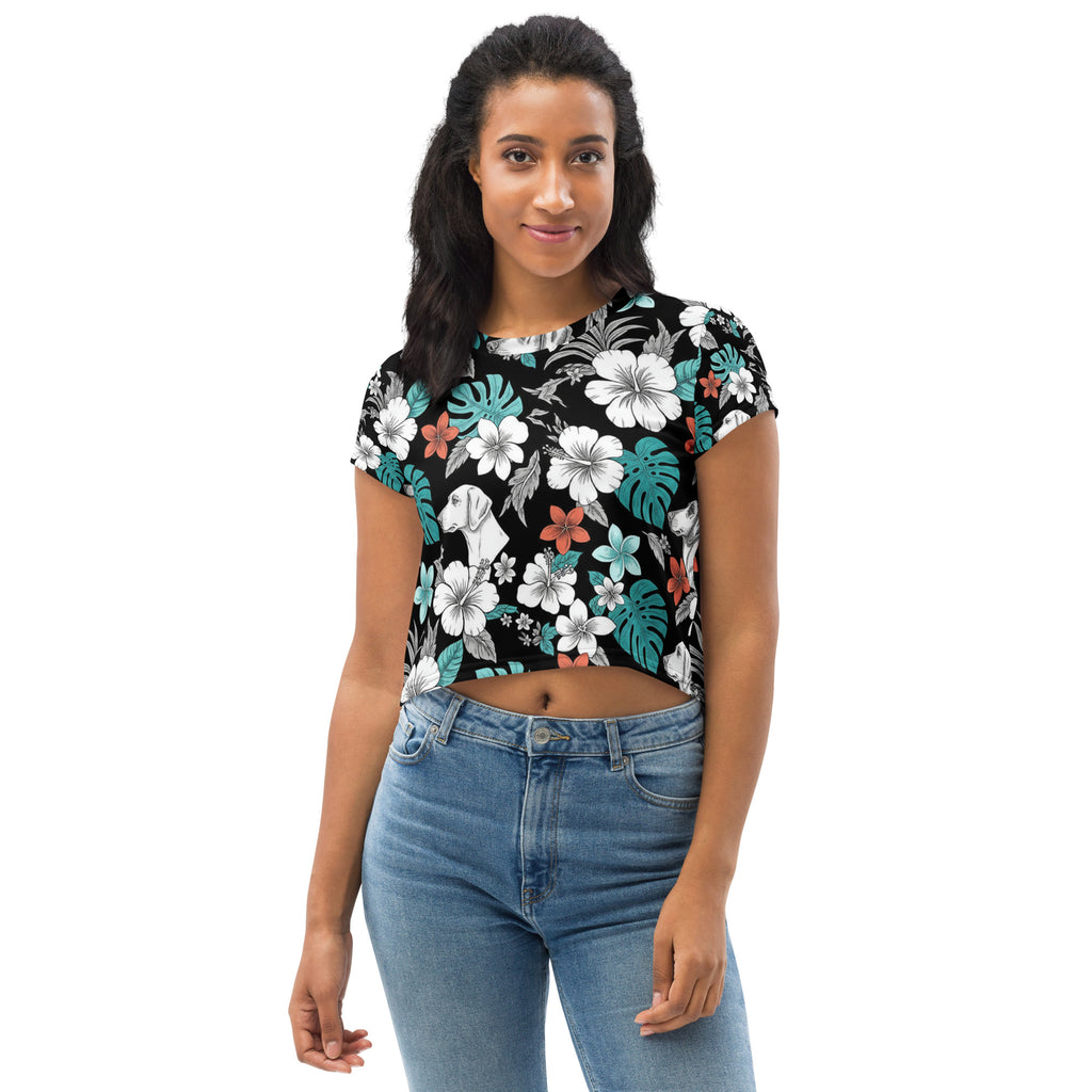 Kurzes Oberteil mit Rundhalsausschnitt, kurze Ärmel, schwarz mit Blumen- und Blattmotiv.