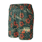 Mesh-Shorts dunkelgrün mit orangen Blumen, elastischer Bund, geprägtes PAW LINE-Logo