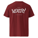 Bordeauxfarbenes Bio-Baumwoll-T-Shirt mit Schriftzug WEALTHY auf der Rückseite